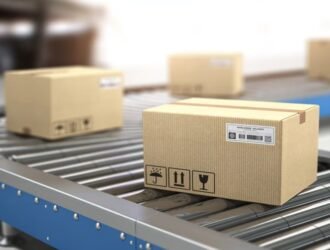 Logistics conveyor systems moving boxes in an automated warehouse conveyor system