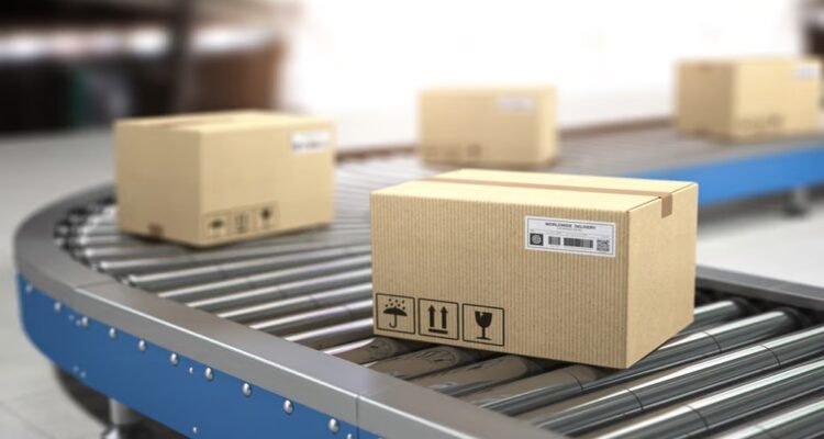 Logistics conveyor systems moving boxes in an automated warehouse conveyor system