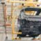 Automotive body moving on a power and free overhead conveyor system